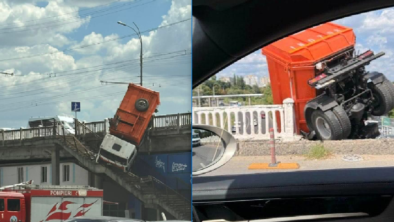 A luat-o pe scară, cu tot cu camion: O autospecială, aproape să cadă de pe podul Ismail. Momentul când șoferul și pasagerul ies din cabina răsturnată